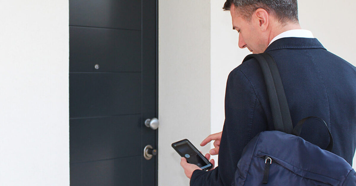 Vacation rental smart home setup: PIN keypad, euro-cylinder smart lock and gate opener managed from the host's phone